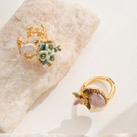 Wholesale Elegant Baroque Style Vacation Flower Copper Hollow Out Inlay 18K Gold Plated Pearl Zircon Open Rings Rings main image 1
