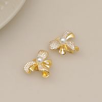 1 Pair Casual Business British Style Bow Knot Inlay Copper Pearl Zircon 18K Gold Plated Ear Cuffs main image 4