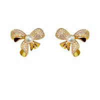 1 Pair Casual Business British Style Bow Knot Inlay Copper Pearl Zircon 18K Gold Plated Ear Cuffs main image 5