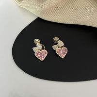 1 Par Elegante Dulce Brillante Forma De Corazón Nudo De Lazo Embutido Cobre Perla Circón Chapados en oro de 18k Pendientes De Gota Puños De Oreja sku image 2