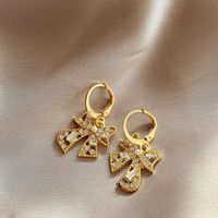 1 Pair Retro Bow Knot Hollow Out Inlay Alloy Rhinestones Drop Earrings main image 1