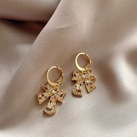 1 Pair Retro Bow Knot Hollow Out Inlay Alloy Rhinestones Drop Earrings main image 5