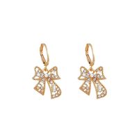1 Pair Retro Bow Knot Hollow Out Inlay Alloy Rhinestones Drop Earrings main image 3