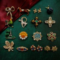 Retro Ethnic Style Animal Flower Bow Knot Alloy Plating Inlay Rhinestones Pearl Women's Brooches main image 1