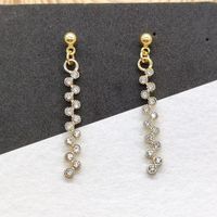 1 Pair Elegant Curve Metal Inlay Alloy Rhinestones Gold Plated Silver Plated Drop Earrings main image 4