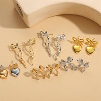 1 Pair Vintage Style Simple Style Commute Heart Shape Bow Knot Inlay Copper Zircon 14K Gold Plated Drop Earrings Ear Studs main image 3