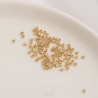 100 Pieces 1.6*0.8 Hole Under 1mm Copper 14K Gold Plated Solid Color Polished Beads main image 3