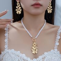 Elegant Luxurious Ginkgo Leaf Artificial Pearl Alloy Beaded 14K Gold Plated Women's Earrings Necklace main image 1