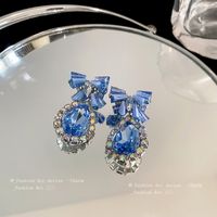 1 Pair Luxurious Sweet Water Droplets Bow Knot Plating Inlay Copper Artificial Crystal Rhinestones Drop Earrings main image 3