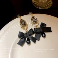 1 Pair Elegant Glam Water Droplets Bow Knot Plating Inlay Alloy Cloth Artificial Crystal Rhinestones Drop Earrings main image 1