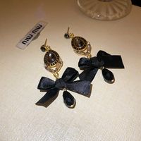 1 Pair Elegant Glam Water Droplets Bow Knot Plating Inlay Alloy Cloth Artificial Crystal Rhinestones Drop Earrings sku image 1