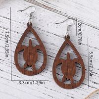 1 Pair Cute Retro Tortoise Water Droplets Hollow Out Wood Drop Earrings main image 2