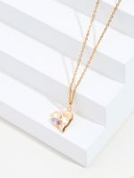 Copper 18K Gold Plated Simple Style Heart Shape Butterfly Hollow Out Inlay Artificial Pearls Zircon Pendant Necklace main image 1