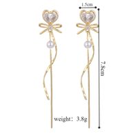 1 Pair Elegant Glam Heart Shape Bow Knot Tassel Plating Inlay Copper Artificial Pearls Zircon Drop Earrings main image 2