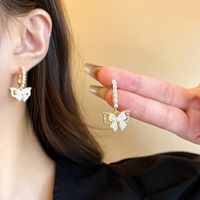 1 Pair Simple Style Classic Style Bow Knot Inlay Alloy Rhinestones Drop Earrings main image 5