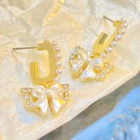 1 Pair Simple Style Classic Style Bow Knot Inlay Alloy Rhinestones Drop Earrings main image 3
