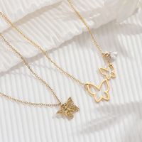 304 Stainless Steel Imitation Pearl 14K Gold Plated Sweet Simple Style Hollow Out Butterfly Pendant Necklace main image 1
