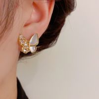 1 Pair Simple Style Classic Style Bow Knot Inlay Sterling Silver Artificial Pearls Ear Studs main image 1