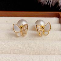 1 Pair Simple Style Classic Style Bow Knot Inlay Sterling Silver Artificial Pearls Ear Studs main image 3