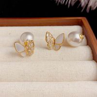 1 Pair Simple Style Classic Style Bow Knot Inlay Sterling Silver Artificial Pearls Ear Studs main image 4