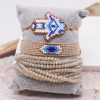 Vintage Style Simple Style Devil's Eye Palm Artificial Crystal Glass Knitting Women's Bracelets main image 1