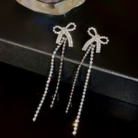 1 Pair IG Style Luxurious Simple Style Tassel Bow Knot Inlay Copper Zircon K Gold Plated Drop Earrings main image 1