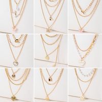 Streetwear Heart Shape Flower Butterfly Arylic Zinc Alloy Layered Women's Layered Necklaces main image 1