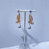 1 Pair Simple Style Classic Style Butterfly Plating Inlay Brass Rhinestones Zircon Gold Plated Drop Earrings main image 3