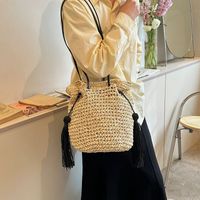 Women's Straw Solid Color Vacation Tassel Bucket String Straw Bag main image 9