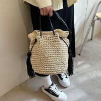 Women's Straw Solid Color Vacation Tassel Bucket String Straw Bag main image 4