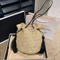 Women's Straw Solid Color Vacation Tassel Bucket String Straw Bag sku image 1