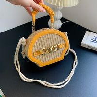Women's Medium Pu Leather Straw Solid Color Vacation Shell Lock Clasp Handbag sku image 3