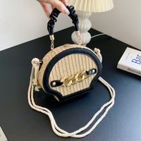 Women's Medium Pu Leather Straw Solid Color Vacation Shell Lock Clasp Handbag sku image 6