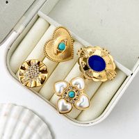 304 Stainless Steel Gold Plated Vintage Style Simple Style Plating Inlay Irregular Heart Shape Turquoise Pearl Zircon Open Rings main image 1