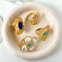 304 Stainless Steel Gold Plated Vintage Style Simple Style Plating Inlay Irregular Heart Shape Turquoise Pearl Zircon Open Rings main image 4