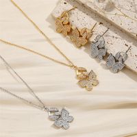 Copper Elegant Lady Simple Style Inlay Animal Splicing Bow Knot Zircon Earrings Necklace main image 1