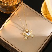 Wholesale Casual Commute Heart Shape Mermaid Bow Knot Titanium Steel Hollow Out Inlay 18K Gold Plated Zircon Pendant Necklace sku image 12