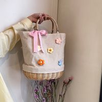 Women's Large Straw Solid Color Flower Bow Knot Vacation Beach Weave Bucket Open Handbag Straw Bag main image 1