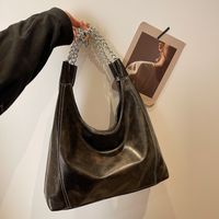 Women's Medium Pu Leather Solid Color Classic Style Pillow Shape Magnetic Buckle Shoulder Bag Crossbody Bag Underarm Bag main image video