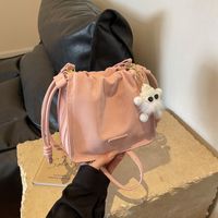 Women's Medium Pu Leather Solid Color Streetwear Bucket Magnetic Buckle Shoulder Bag Crossbody Bag main image video