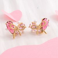 1 Pair Simple Style Classic Style Heart Shape Bow Knot Plating Inlay Copper Zircon 18K Gold Plated Ear Studs main image 1