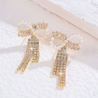 1 Pair Shiny Bow Knot Plating Inlay Copper Artificial Pearls Zircon 18K Gold Plated Drop Earrings main image 2