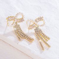 1 Pair Shiny Bow Knot Plating Inlay Copper Artificial Pearls Zircon 18K Gold Plated Drop Earrings main image 3