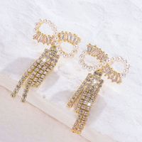 1 Pair Shiny Bow Knot Plating Inlay Copper Artificial Pearls Zircon 18K Gold Plated Drop Earrings main image 5