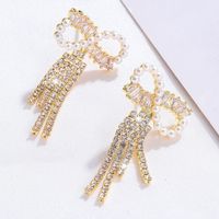 1 Pair Shiny Bow Knot Plating Inlay Copper Artificial Pearls Zircon 18K Gold Plated Drop Earrings main image 4