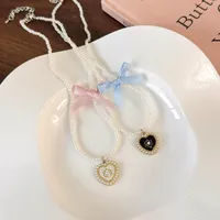 Elegant Glam Sweet Heart Shape Flower Bow Knot Imitation Pearl Alloy Beaded Inlay Rhinestones Pearl Women's Pendant Necklace main image 1