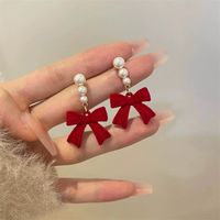 1 Pair Cute Sweet Bow Knot Inlay Alloy Flocking Artificial Pearls Drop Earrings main image 4