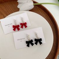 1 Pair Cute Sweet Bow Knot Inlay Alloy Flocking Artificial Pearls Drop Earrings main image 1