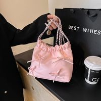 Women's Medium Pu Leather Solid Color Bow Knot Cute Classic Style Square Magnetic Buckle Bucket Bag main image video