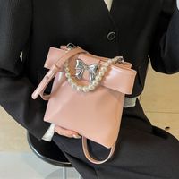 Women's Medium Pu Leather Solid Color Bow Knot Classic Style Pearls Square Magnetic Buckle Crossbody Bag main image 3